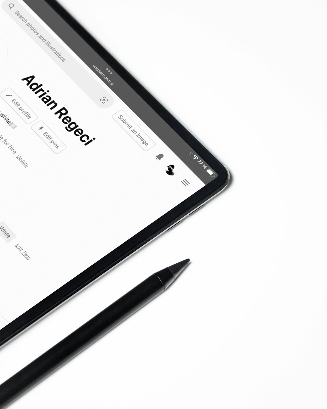 iPad and stylus on desk.